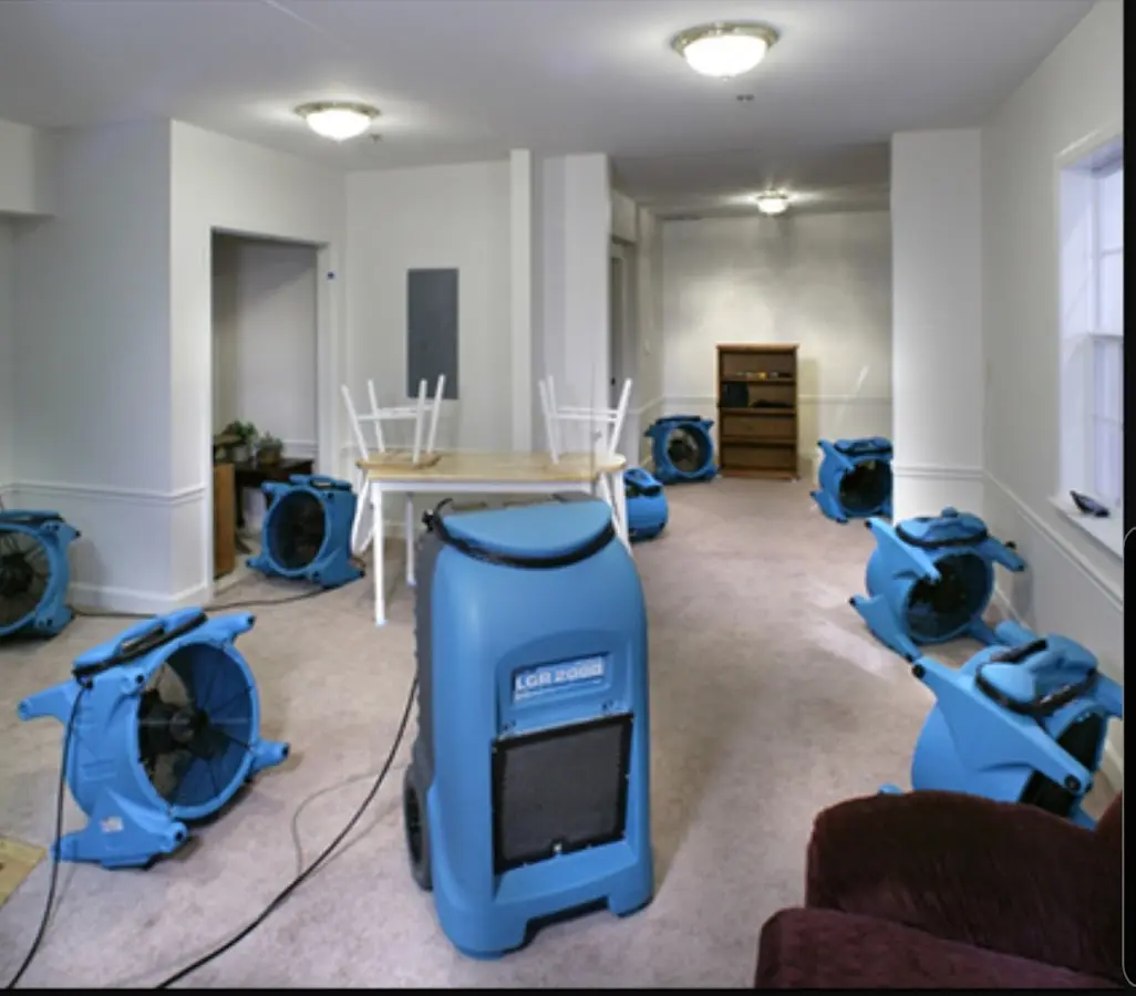 Air movers and dehumidifier setup for Water Extraction & Removal in Baxter